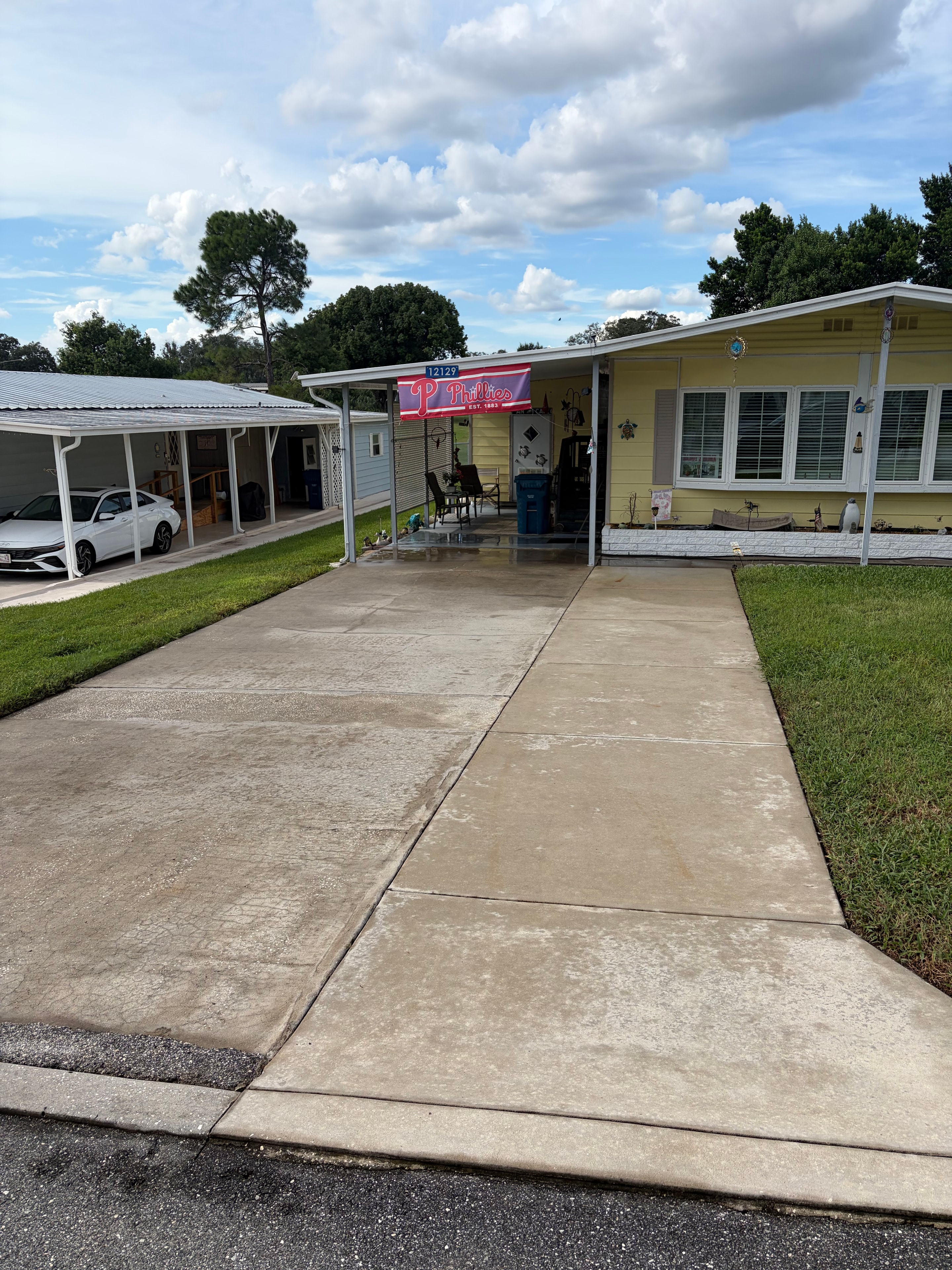 Spotless driveway after No BS Pressure Washing